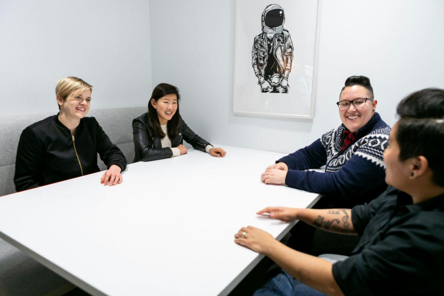 Team reviewing profitability analysis and strategic planning documents