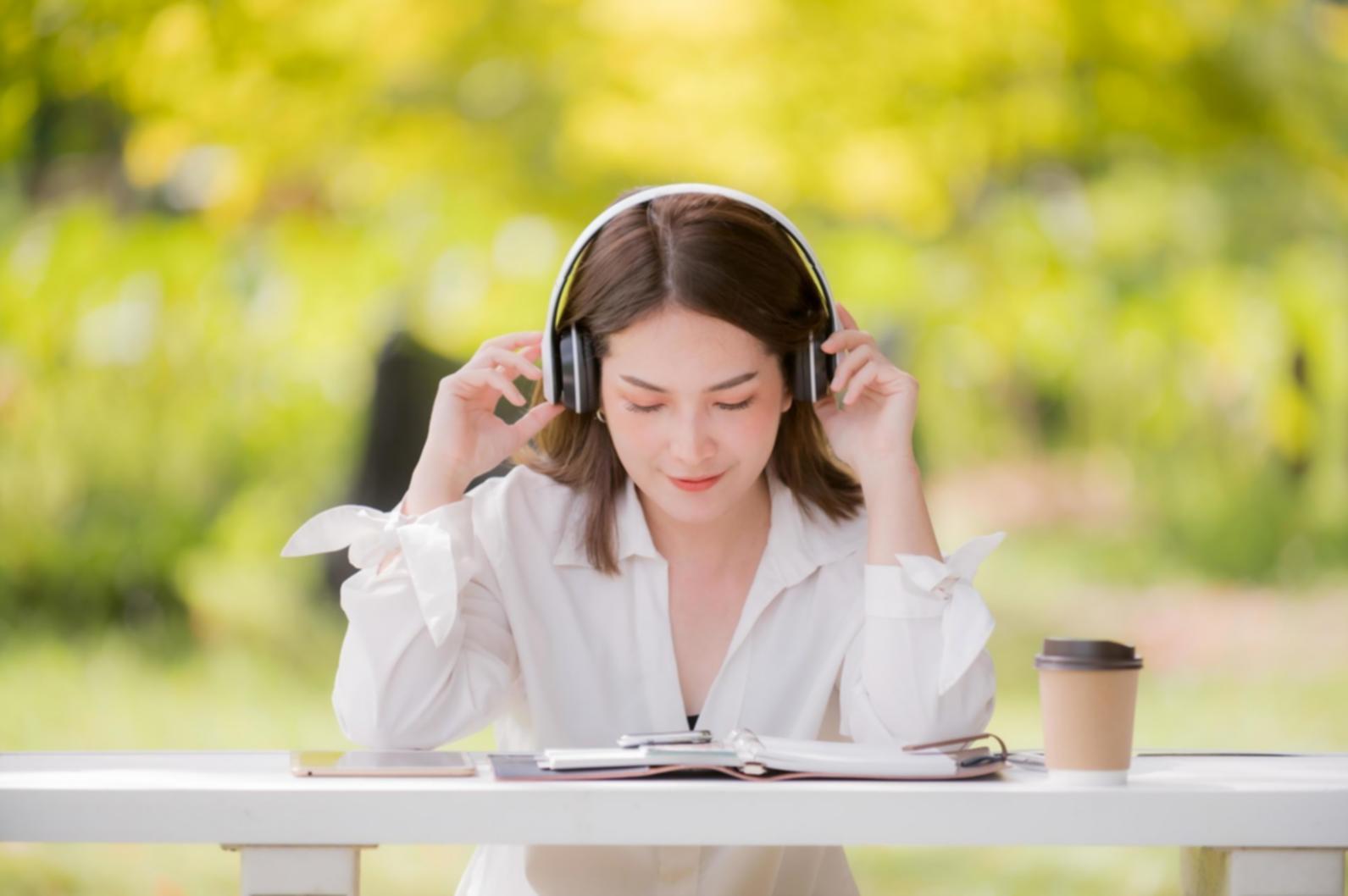 Small group collaborating on financial analysis exercise with charts