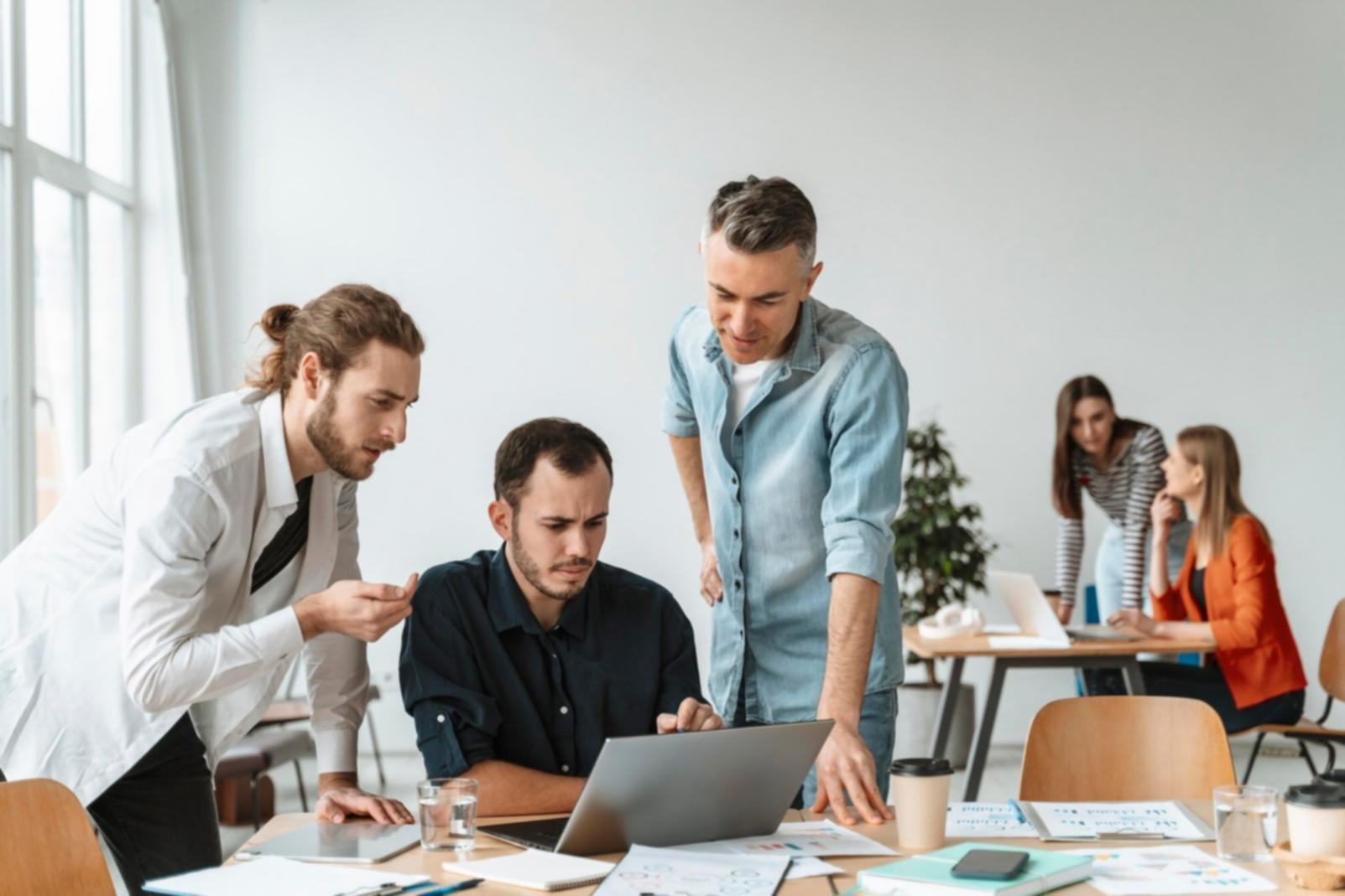 Instructor demonstrating profitability analysis techniques to engaged learners